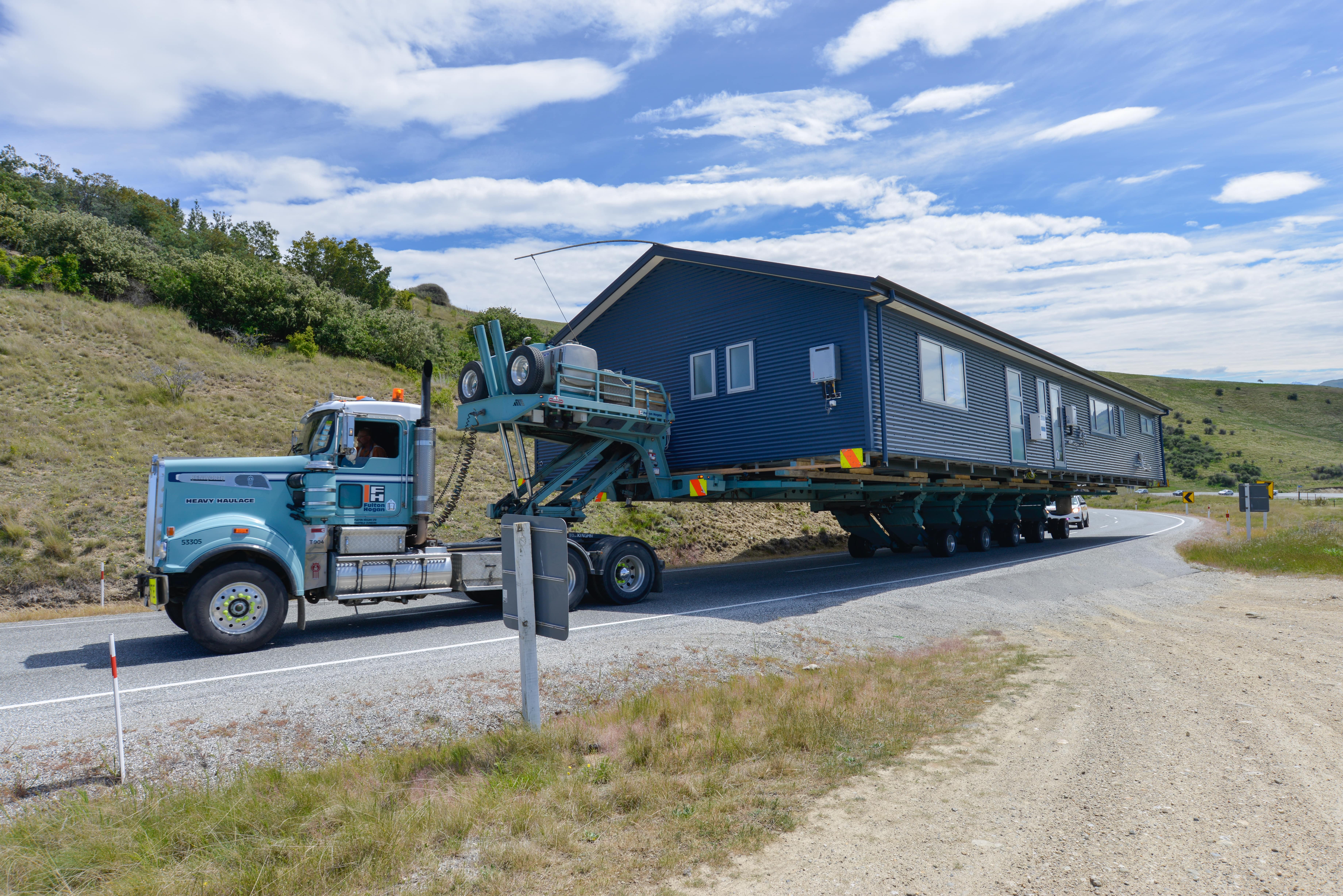 Diesel Truck Transporting Mobile Home