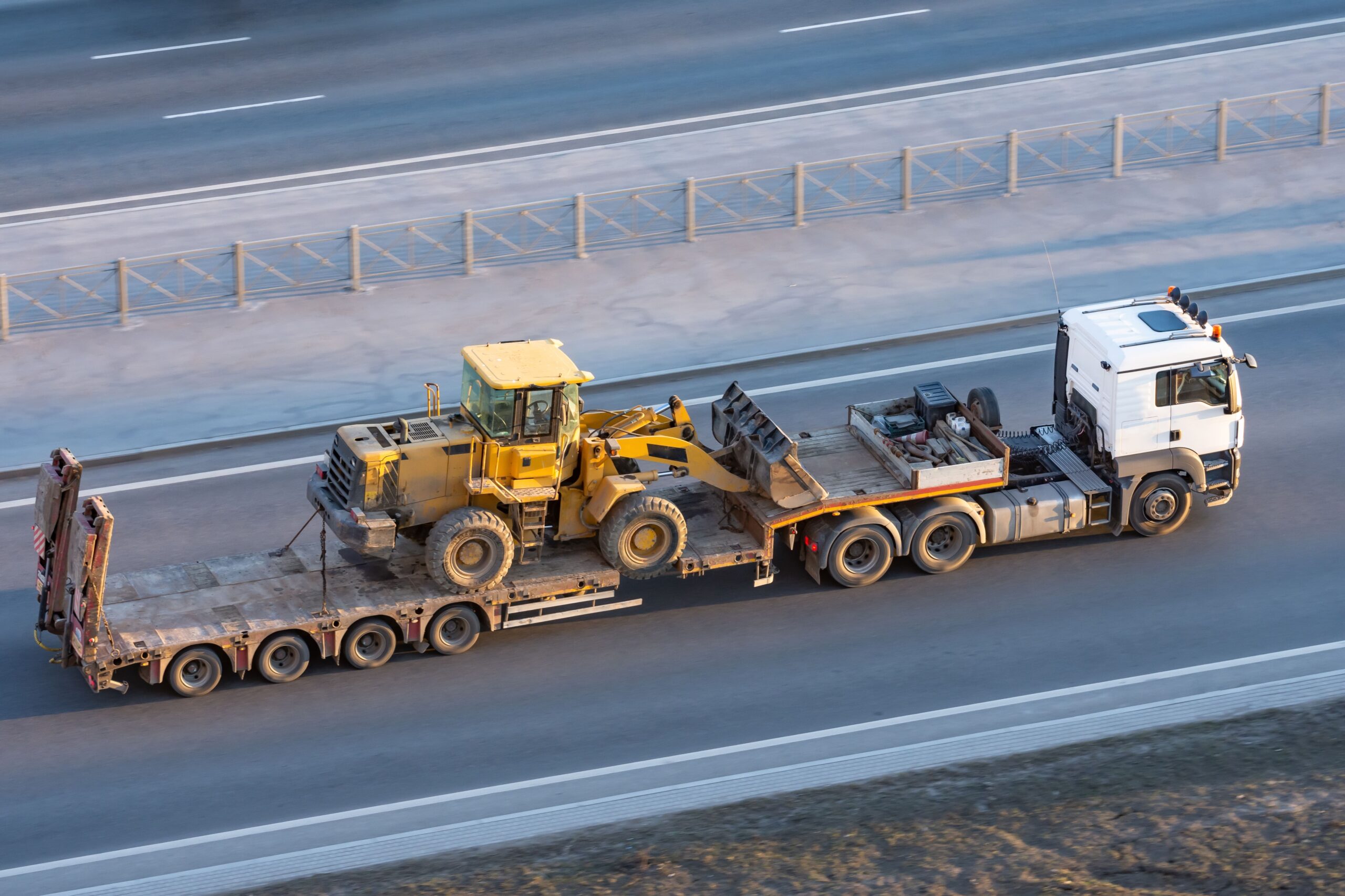 Bulldozer transport in Idaho Truck transporting bulldozer as part of heavy equipment hauling in Idaho